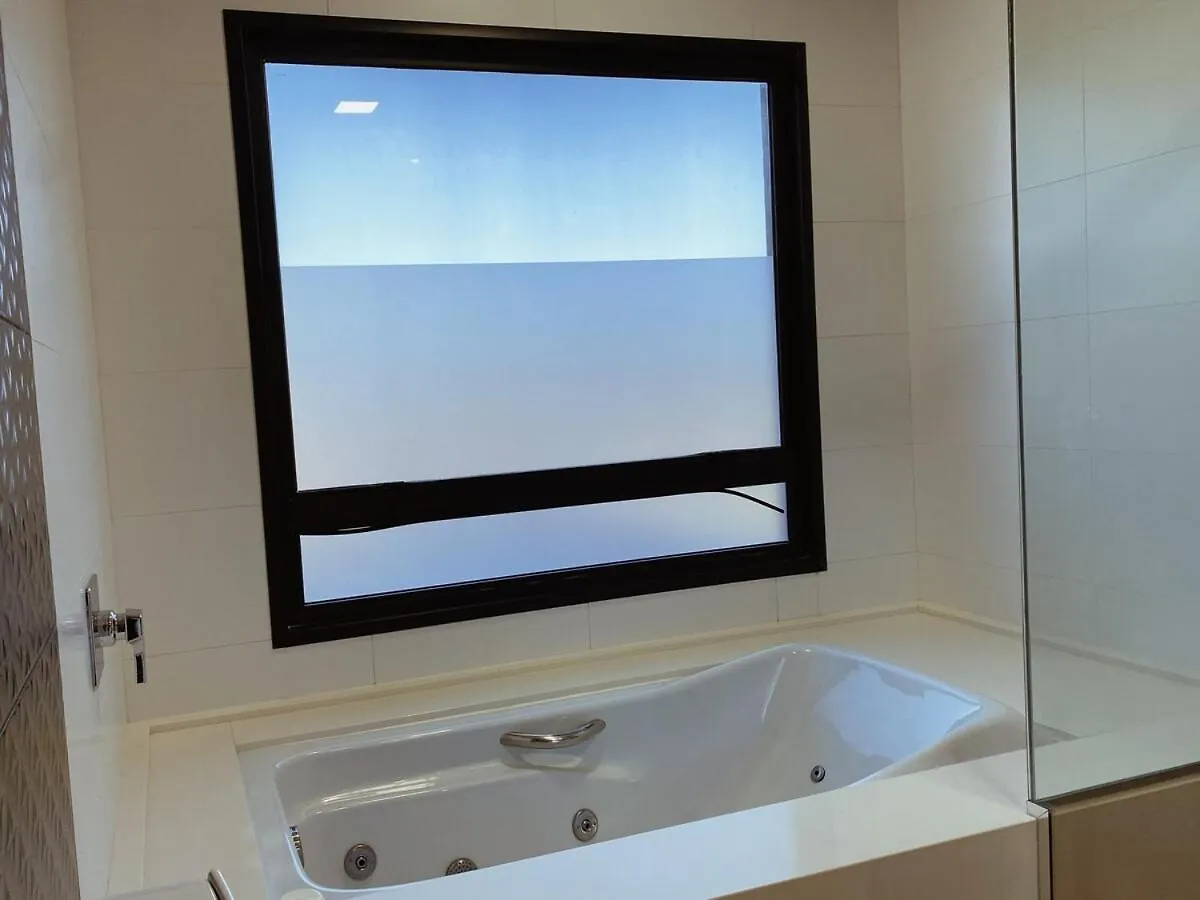 Casa 4 Suites Garopaba, Rosa Internacional - Surfland Brazylia