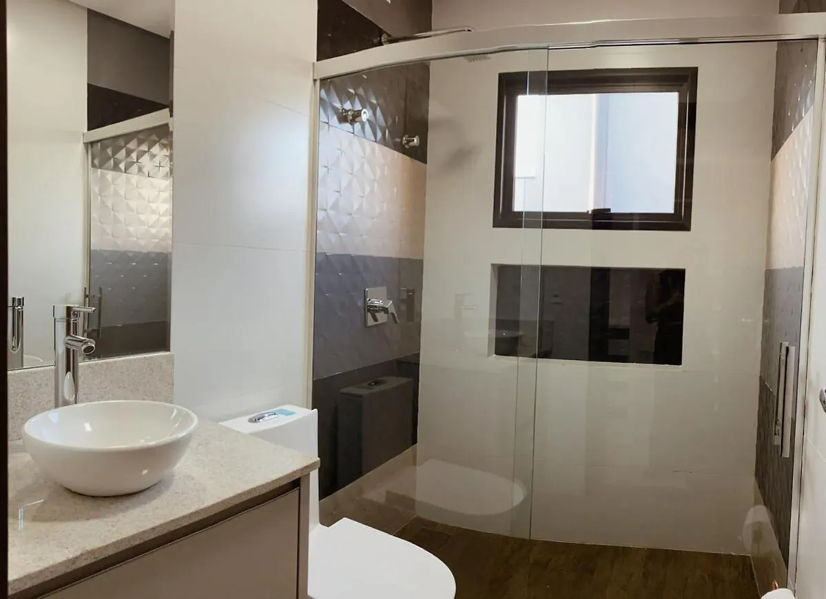 Casa 4 Suites Garopaba, Rosa Internacional - Surfland